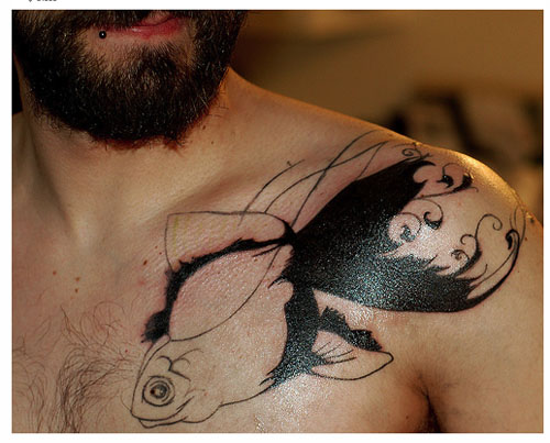 goldfish tattoo. getting a goldfish tattoo